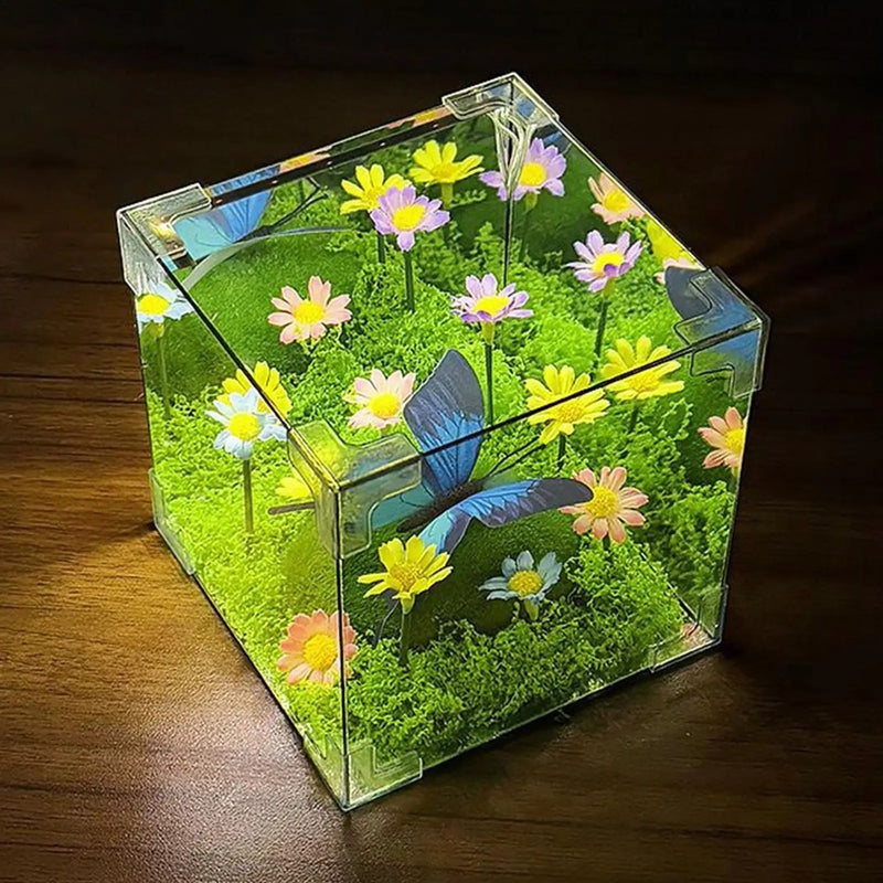 La lámpara encendida de lado: margaritas de colores y mariposa azul