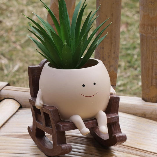 La maceta con planta alta de referencia