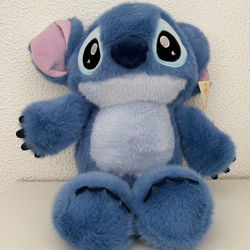 Peluche Stitch que corre de 35 cm, sentado, de frente